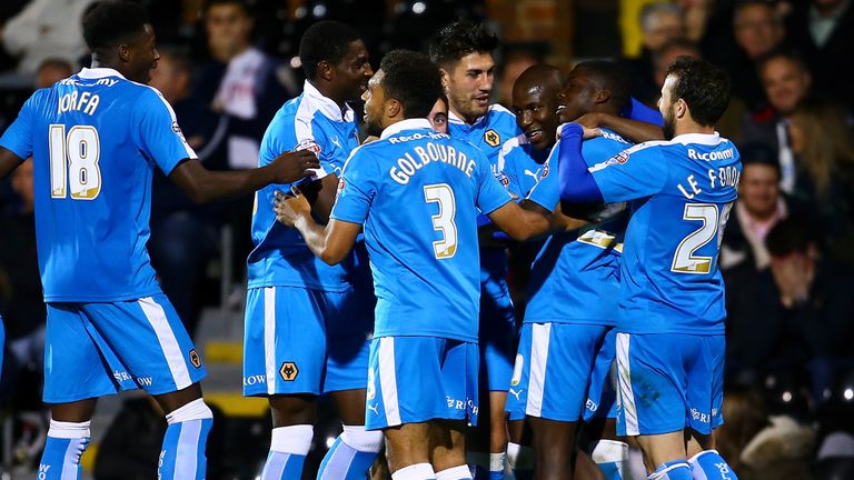 LONDON, ENGLAND - SEPTEMBER 29:  Wolves celebrate with Sheyi Ojo of Wolves after he scores to make it 2-0 during the Sky Bet Football League Championship m