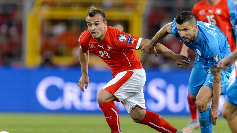 Switzerland midfielder Xherdan Shaqiri (left)