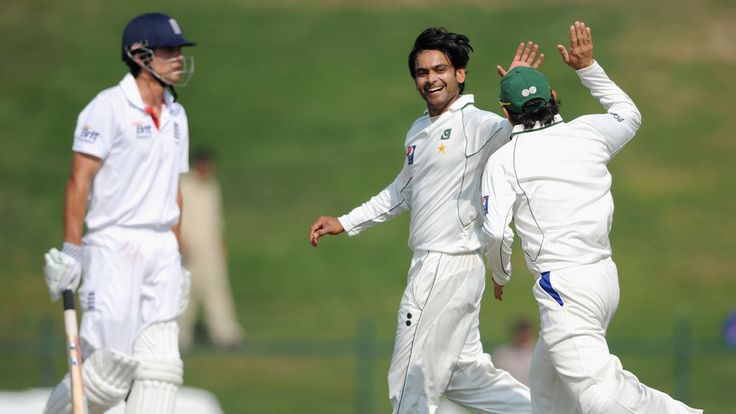 Mohammad Hafeez celebrates dismissing Alastair Cook in the second Test, in Abu Dhabi, in 2012