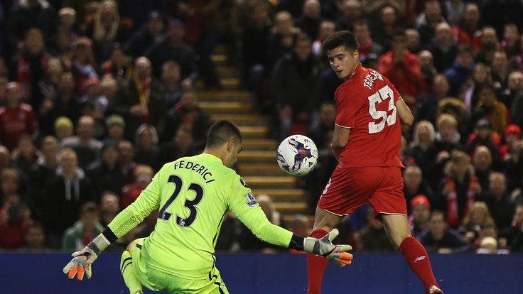 Joao Carlos Teixeira of Liverpool backheels past Adam Federici of Bournemouth during the Capital One Cup Fourth Round match at Anfield on October 28, 2015