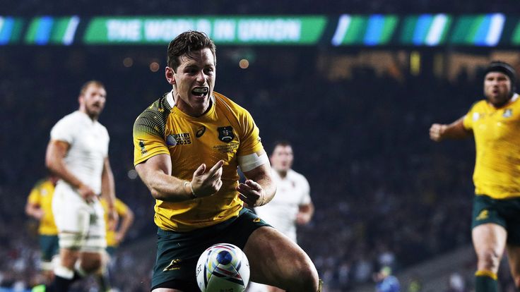 Australia fly-half Bernard Foley celebrates after scoring his second try against England