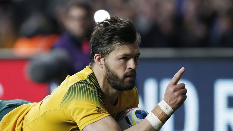 Australia's wing Adam Ashley-Cooper scores his team's third try during a semi-final match of the 2015 Rugby World Cup between Argentina and Australia