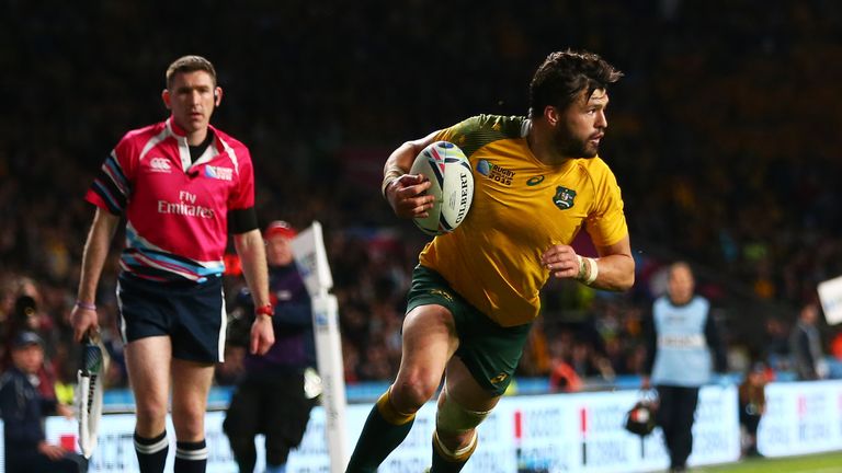 Adam Ashley-Cooper races through to score his third try during the 2015 Rugby World Cup SF between Australia and Argentina