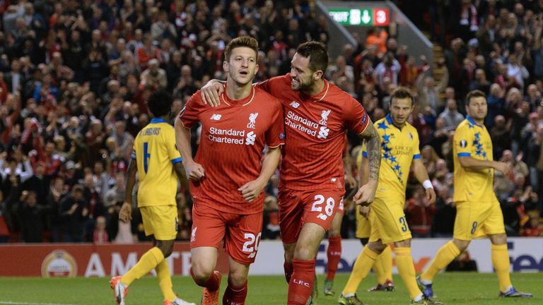 Adam Lallana is congratulated by Danny Ings after opening the scoring for Liverpool against Sion