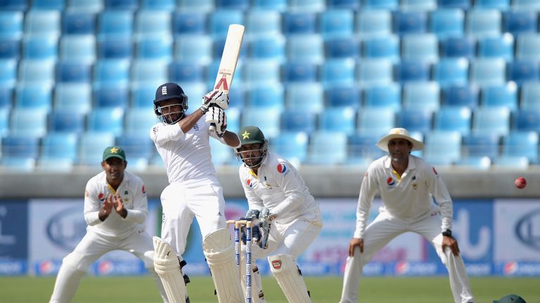 DUBAI, UNITED ARAB EMIRATES - OCTOBER 26:  Adil Rashid of England bats during day five of the 2nd test match between Pakistan and England at Dubai Cricket 