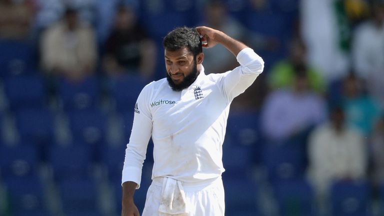 Adil Rashid of England reacts after being hit to the boundary during day two of the 1st Test between Pakistan and England