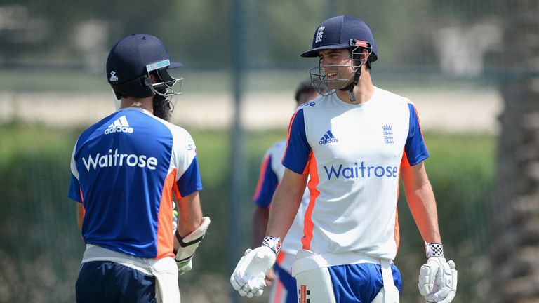 England captain Alastair Cook speaks with Moeen Ali during a nets session in Dubai
