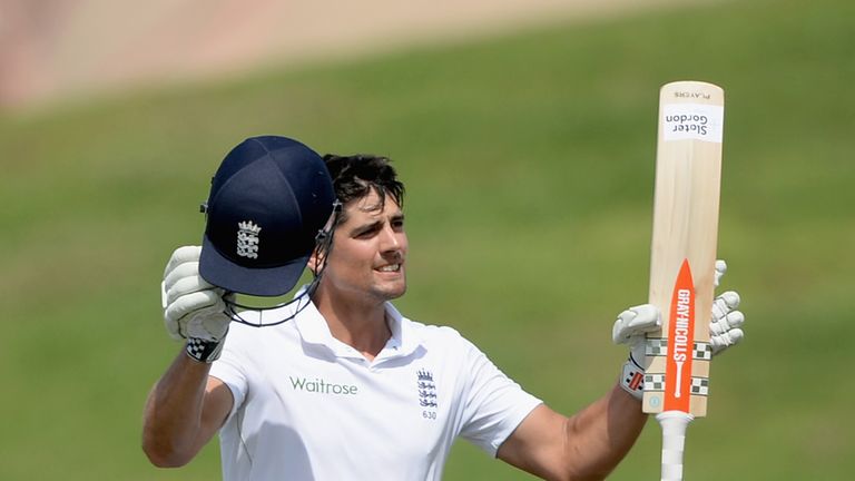 England captain Alastair Cook celebrates reaching his century during day three of the first Test