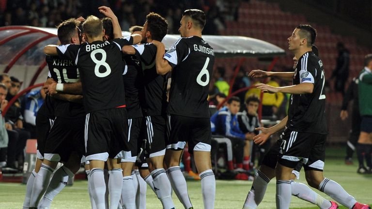 Albania's players celebrate as they qualified for the European Championships with a win over Armenia. 