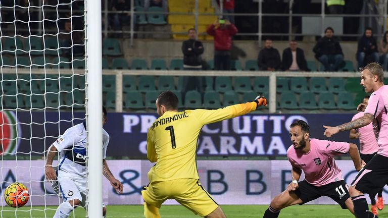 Alberto Gilardino of Palermo scores the equalising goal