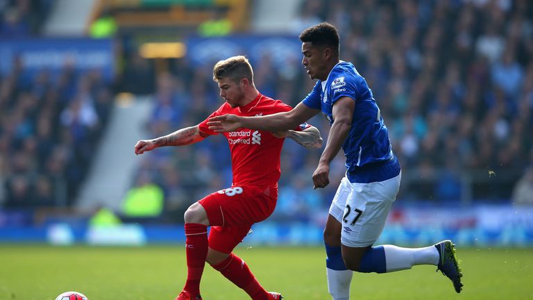 LIVERPOOL, ENGLAND - OCTOBER 04:  Alberto Moreno of Liverpool is closed down by Tyias Browning of Everton during the Barclays Premier League match between 