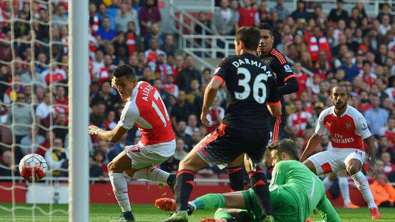 Alexis Sanchez scores Arsenal's first goal against Manchester United