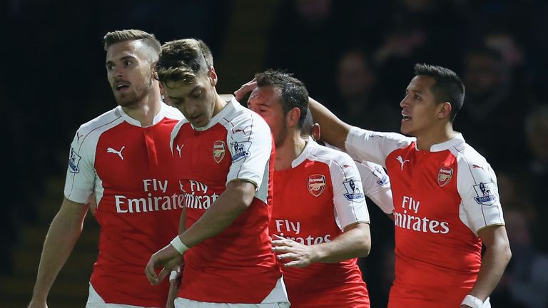 Alexis Sanchez of Arsenal (R) celebrates with team mates as he scores their first goal