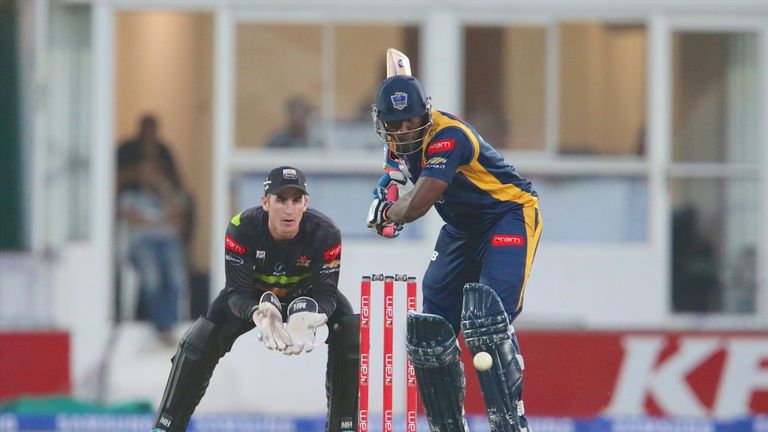 EAST LONDON, SOUTH AFRICA - NOVEMBER 21: Craig Kieswetter of Chevrolet Warriors (L) and Andre Russell of Chevrolet Knights during the Ram Slam T20 Challeng