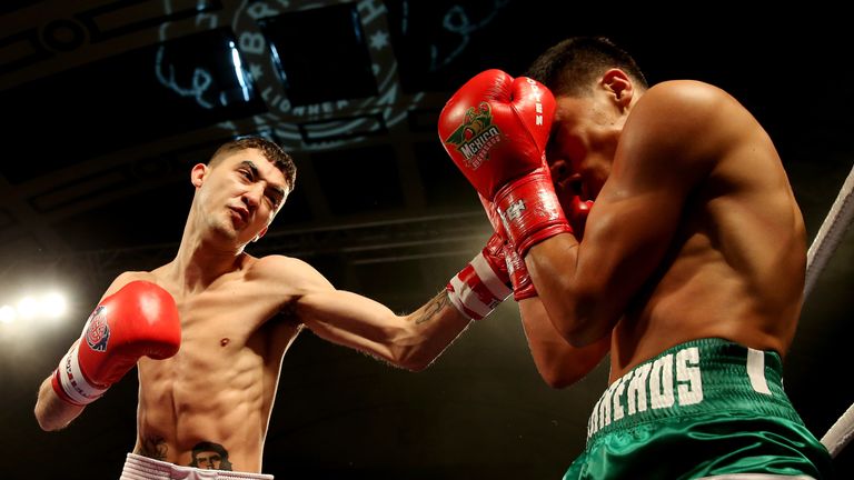 Andrew Selby of the British Lionhearts in action with Aaron Alameda of  the Mexico Guerreros during their 50-54KG bout during 