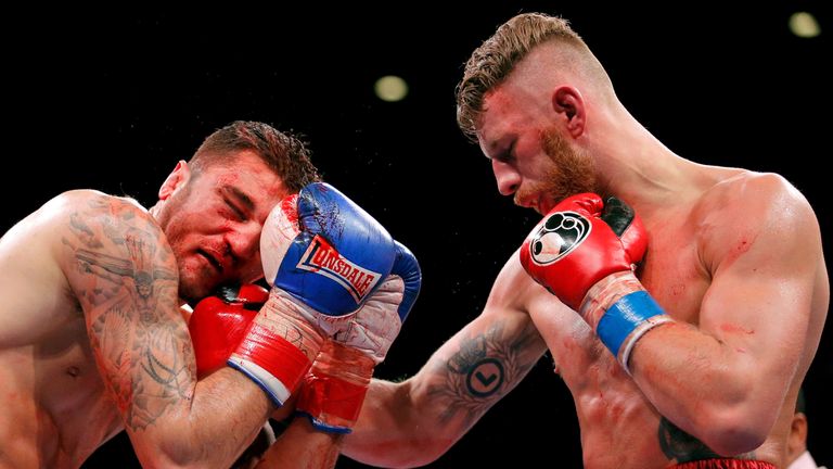  Andrzej Fonfara (R) throws a right at Nathan Cleverly