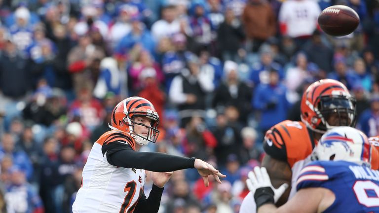 Andy Dalton threw three touchdown passes as CIncinnati beat Buffalo 34-21