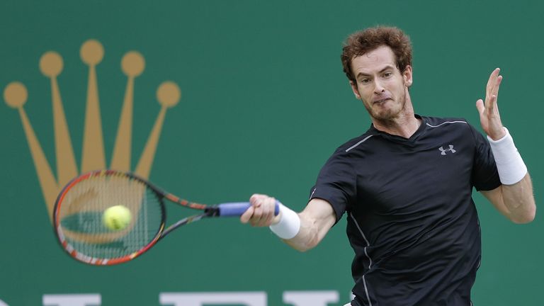 Andy Murray of Great Britain returns a shot against Steve Johnson of the United States during the men's singles second round