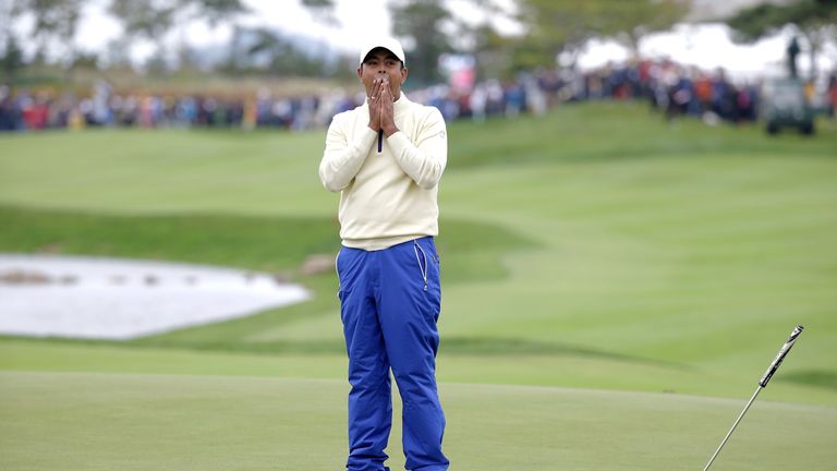 INCHEON, SOUTH KOREA - OCTOBER 11:  Anirban Lahiri of the International Team reacts after a putt on the 18th hole during the Sunday singles