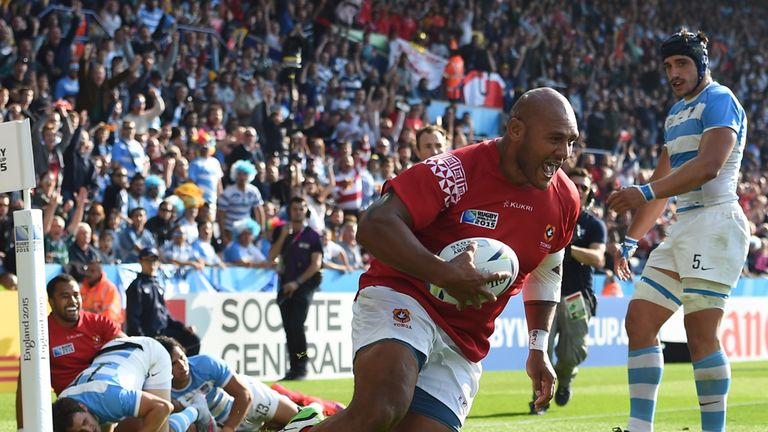 Tonga's prop Soane Tonga'uiha (C) scores a try during a Pool C match of the 2015 Rugby World Cup between Argentina and Tonga 