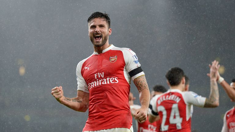Arsenal's Olivier Giroud celebrates scoring his side's first goal during the Barclays Premier League match v Everton at the Emirates Stadium