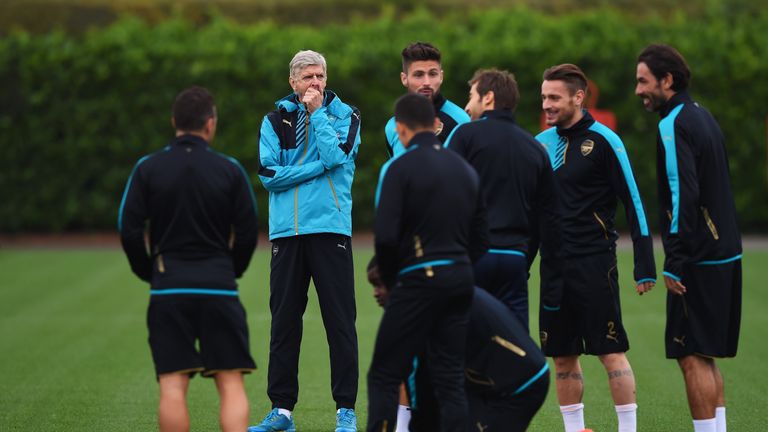 Arsene Wenger oversees training on Monday ahead of Arsenal's Champions League game against Bayern Munich