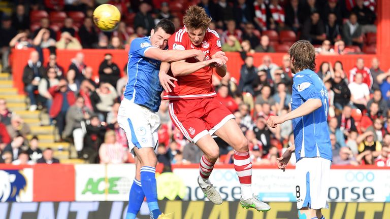 A rare moment of delight for Aberdeen, as Ash Taylor  heads home at Pittodrie to reduce the deficit to 1-2