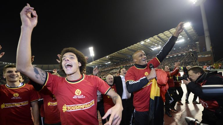 Belgium's players celebrate at the end of the Euro 2016 qualifying football match between Belgium and Israel,