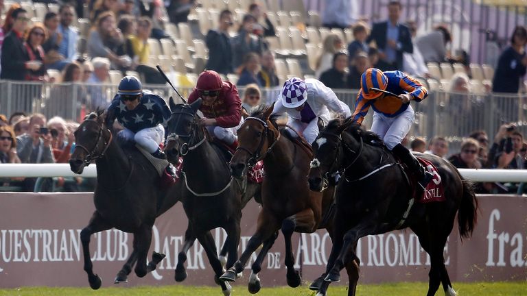 Ryan Moore riding Ballydoyle (R) win The Total Prix Marcel Boussac-Criterium Des Pouliches at Longchamp racecourse on October 04, 2015 in Paris, France