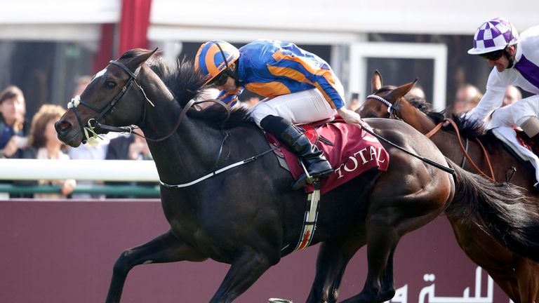Ryan Moore riding Ballydoyle (R) win The Total Prix Marcel Boussac-Criterium Des Pouliches at Longchamp racecourse on October 