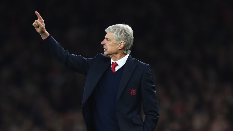 LONDON, ENGLAND - OCTOBER 20:  Arsene Wenger manager of Arsenal reacts during the UEFA Champions 