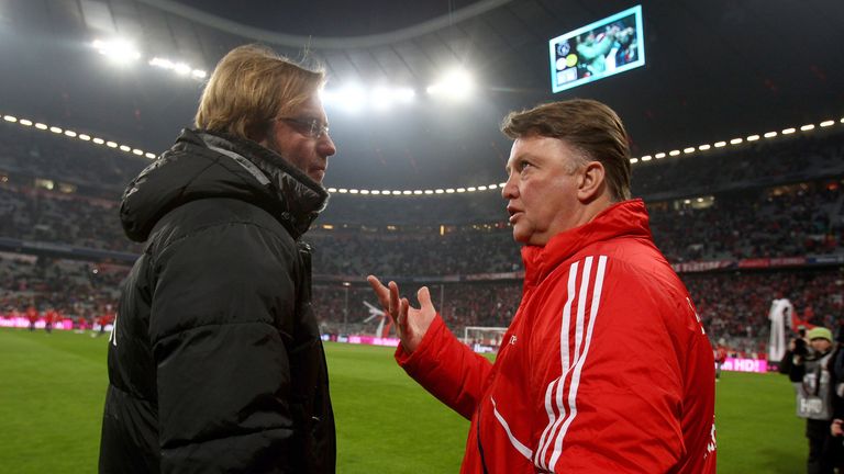 Head coach Louis van Gaal of Bayern Munich and head coach Jurgen Klopp of Borussia Dortmund talk prior to the Bundesliga match at Allianz Arena in 2010