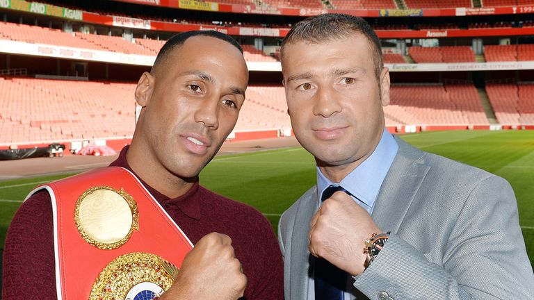 James Degale and Lucian Bute (right) pose for pictures after a press conference at the Emirates Stadium, London.