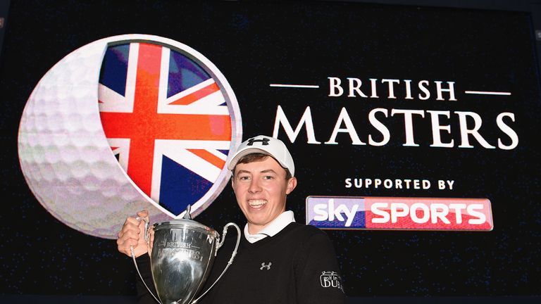 Matthew Fitzpatrick shows off his first trophy as a professional
