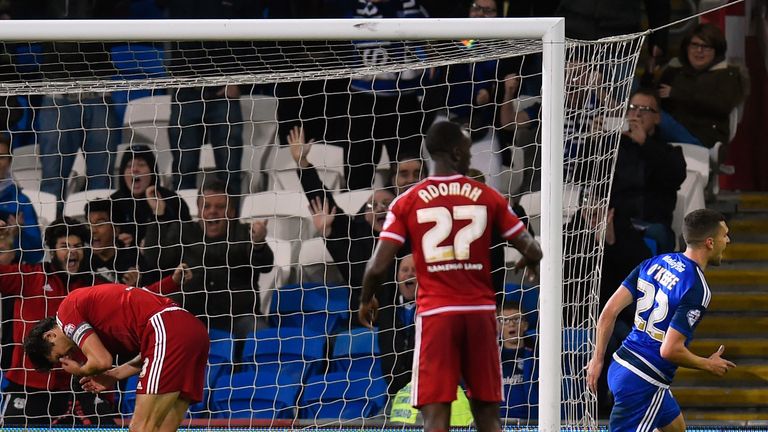 George Friend of Boro (c) reacts after putting the ball into his own net for the first Cardiff goal 