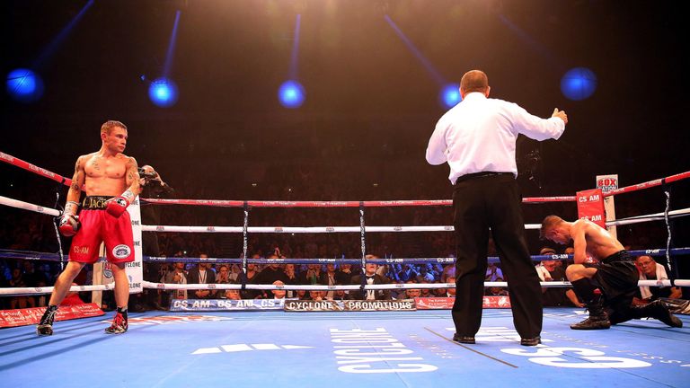 Carl Frampton (left) in action against France's Jeremy Parodi during their IBF Super Bantamweight bout at the Odyssey Arena, Belfast.