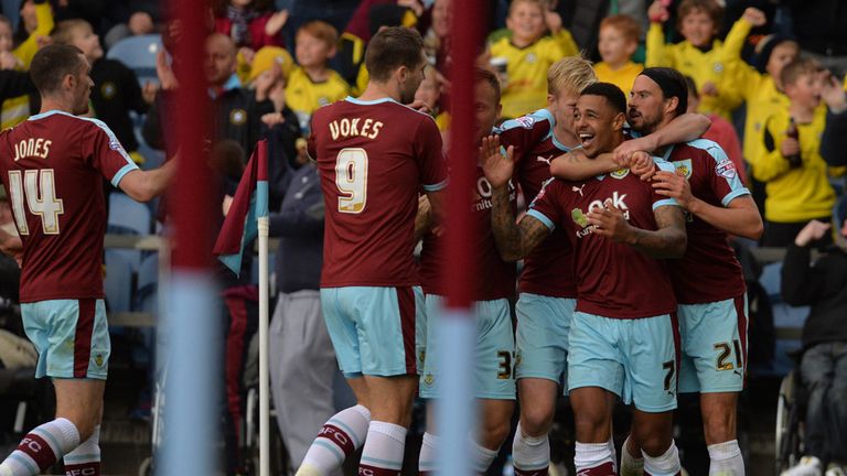 Burnley's Andre Gray (second from the right) celebrates with teammates after scoring his side's first goal during the Sky Bet Championship match at Turf Mo