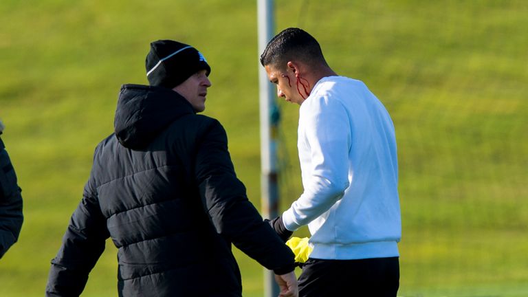 Celtic's Emilio Izaguirre (right) leaves the training field with physio Tim Williamson