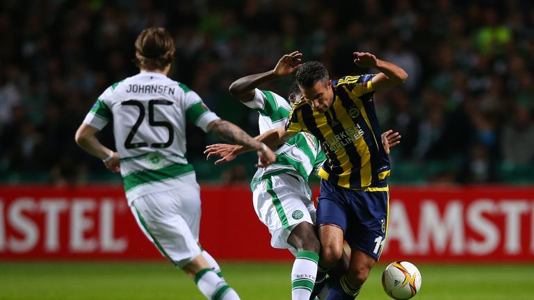 Dedryck Boyata of Celtic vies with Robin van Persie of Fenerbahce during the UEFA Europa League match between Celtic FC an
