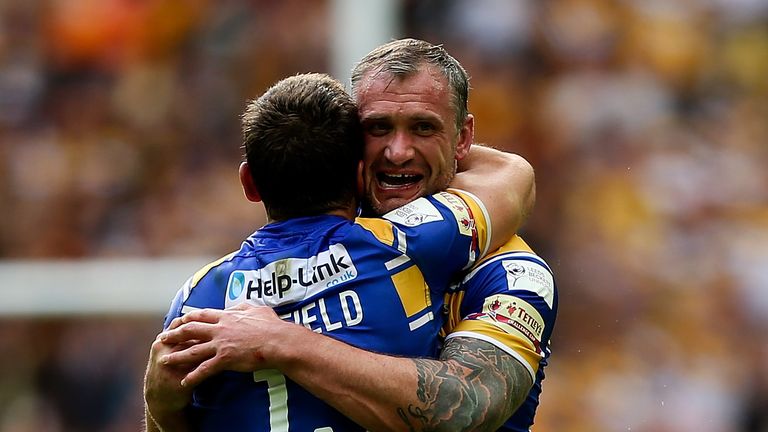 LONDON, ENGLAND - AUGUST 23: Jamie Peacock and Captain Kevin Sinfield of Leeds embrace after winning the Tetley's Challenge Cup Final between Leeds Rhinos 