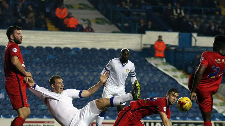 Chris Wood takes a tumble in the Blackburn box