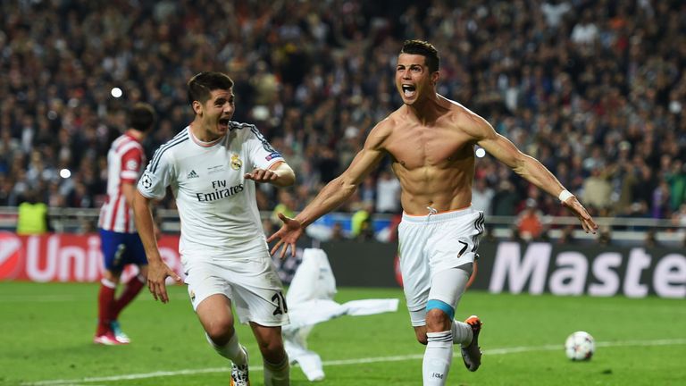 LISBON, PORTUGAL - MAY 24:  Cristiano Ronaldo of Real Madrid celebrates with Alvaro Morata of Real Madrid after scoring their fourth goal from the penalty 