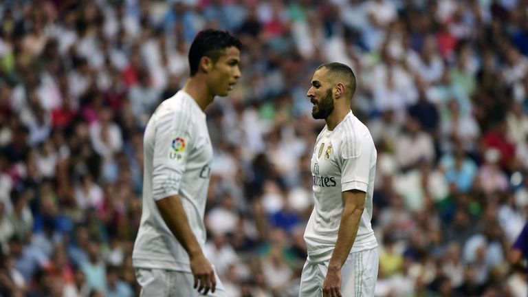 Karim Benzema and Cristiano Ronaldo look on during the La Liga match Real Madrid vs Malaga at the Santiago Bernabeu stadium on September 26