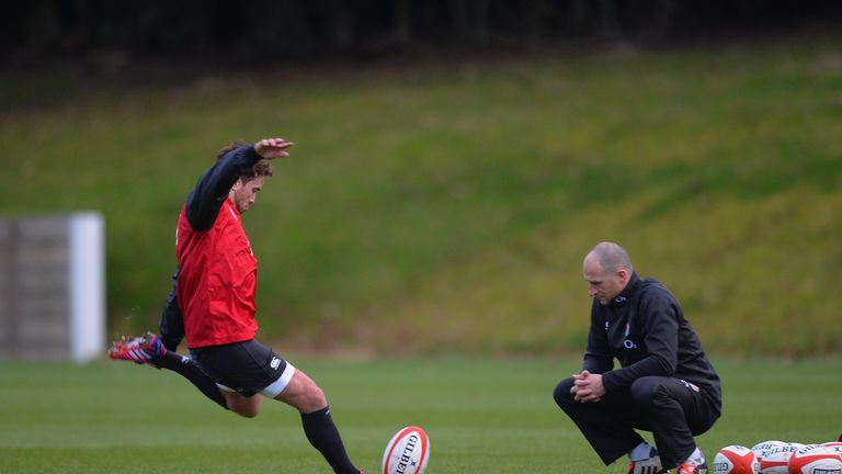 Danny Cipriani gets some kicking coaching from Mike Catt during the England Rugby Training Session at Pennyhill Park