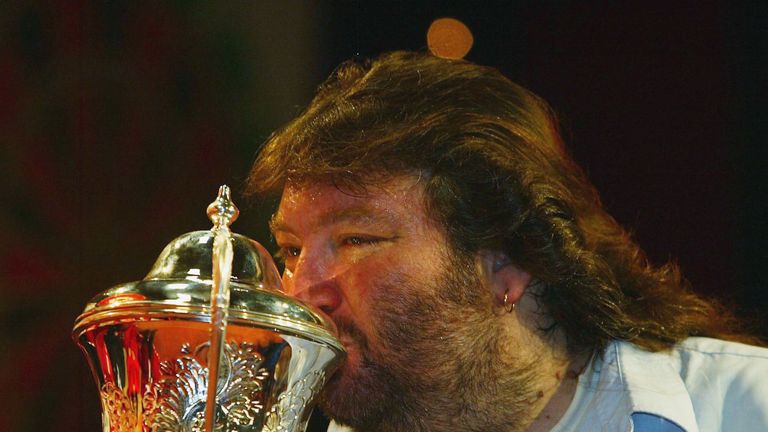 Andy Fordham kisses the trophy after beating Mervyn King in the final of The BDO Lakeside World Darts in 2004