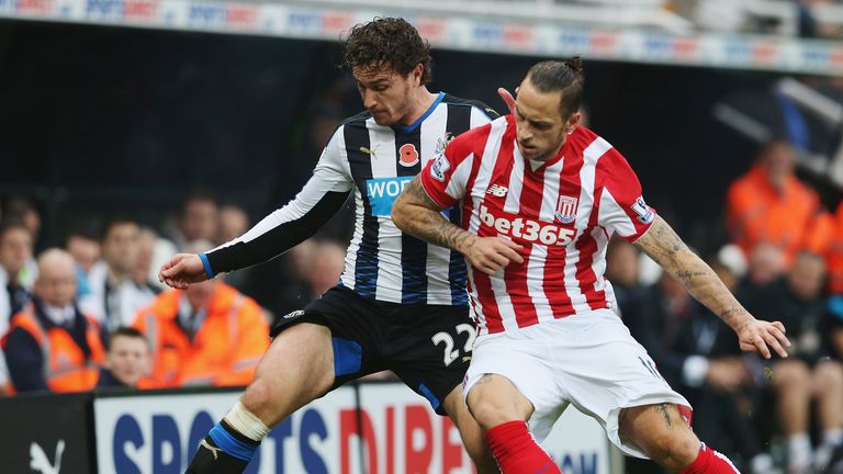 Daryl Janmaat and Marko Arnautovic tangle