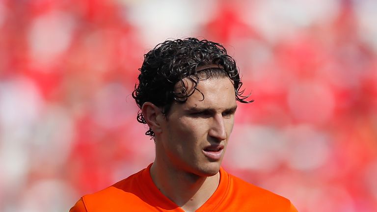 SAO PAULO, BRAZIL - JUNE 23:  Daryl Janmaat of the Netherlands holds the match ball after the 2014 FIFA World Cup Brazil Group B match between the Netherla