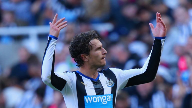 NEWCASTLE UPON TYNE, ENGLAND - SEPTEMBER 19:  Daryl Janmaat of Newcastle United celebrates scoring his team's first goal during the Barclays Premier League