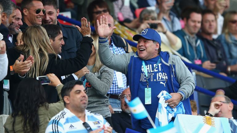 Diego Maradona celebrates Argentina's second try against Tonga