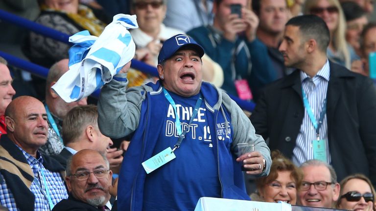 Diego Maradona celebrates Argentina's first try against Tonga
